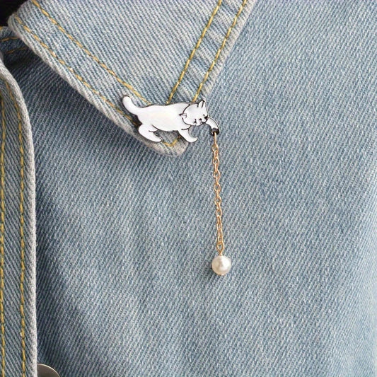 🐱✨ Playful Cat with Pearl Dangle Pin